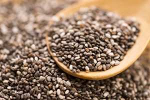 Nutritious chia seeds on a wooden spoon